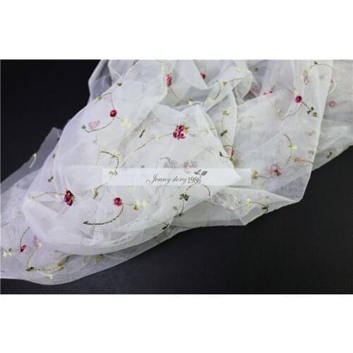 2017High quality Blue Polka Dot Chiffon fabric jacquard little perspective fashion elegant dress shirt fabric A small white embr