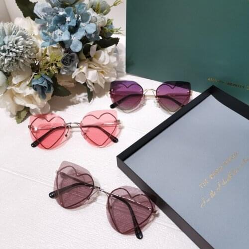 2020 new Taoxin rimmed sunglasses 20301 fashion rimless street photography childrens polarized glasses manufacturer