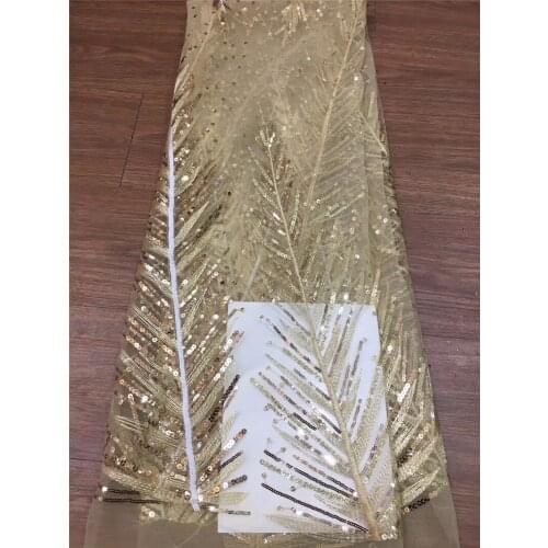 Embroidered tulle french net lace YG-557 for fashion dress embroidered lace fabric with sequins