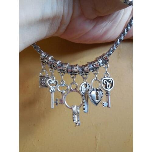 100 pcs/Lot Mix heart turtle dog rabbit hope cross Vintage Silver Dangle Charms Jewelry DIY Findings For European Bracelet ZYY04