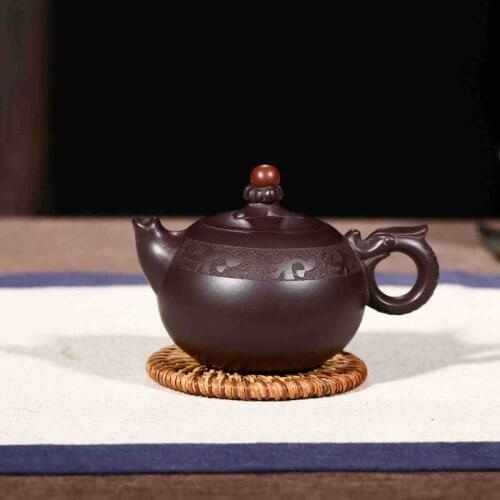 Yixing authentic famous peng-cheng gu all hand undressed ore purple clay sketch the teapot tea wechat business agent
