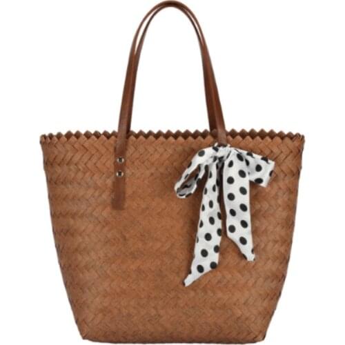 Wholesale of grass-made large capacity beach hand-held womens bags fashion woven bucket handbags