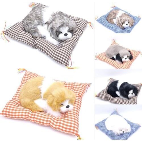 A Simulated Sleeping Dog Is Called A Cloth Mat. Sleeping Dog Car Will Be Decorated With A New Christmas Present