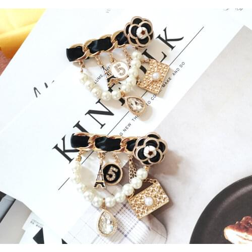 PORTGAS Brooches
