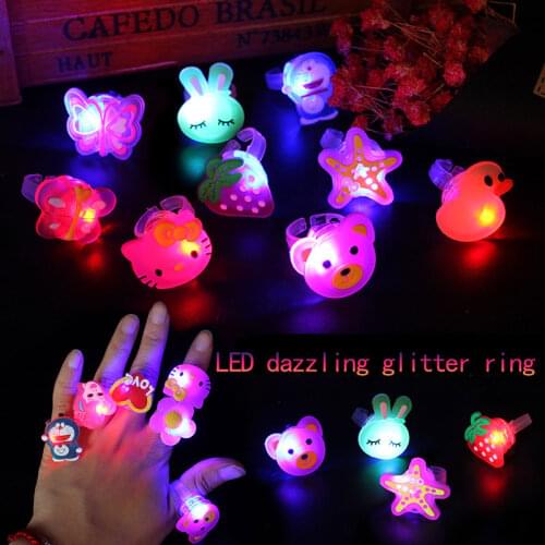 12pcs Luminous rings new kids toys flash gifts LED cartoon lights glow in the dark toys for childs playing in night Action Toy