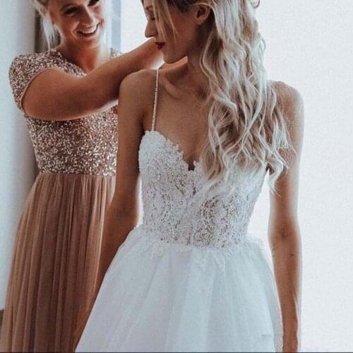 Boho Wedding Dresses Sweetheart Neckline Backless Lace Appliques Pearls Spaghetti Straps A-Line Beach Floor-Length Bridal Gowns