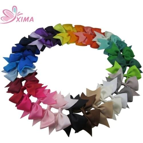 XIMA 64pcs/lot 3.5 Inch Grosgrain Ribbon Hair Bows Hairpins Kids Hair Accessories For Girl Hair Solid Bows With Clips Headwear