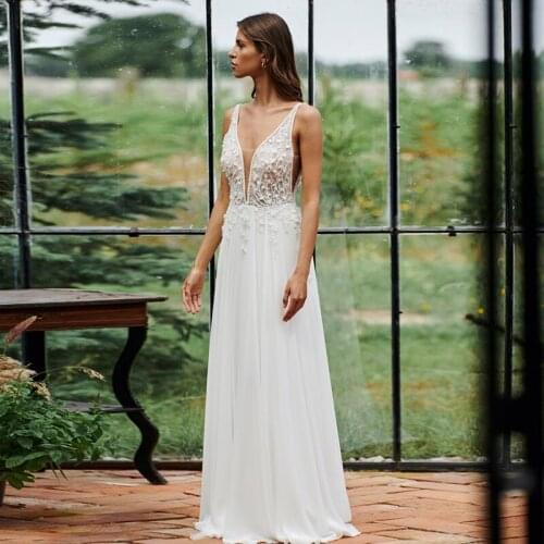 Princess Wedding Dresses Sexy V Neck Appliques Sequins Beach Bridal Gowns Plus Size Wedding Gowns Elegant