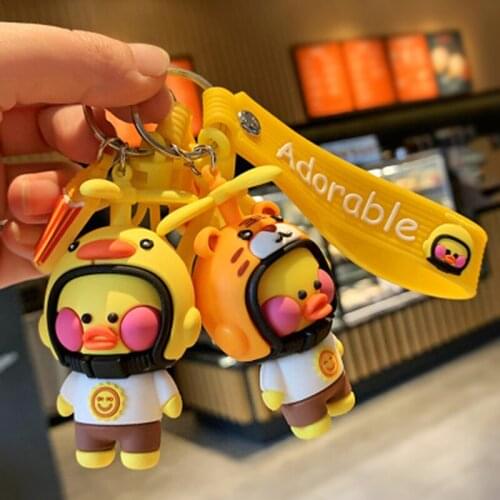 Fashion metal cartoon cute little yellow duck doll keychain creative small gift mobile phone backpack car pendant fun keychain