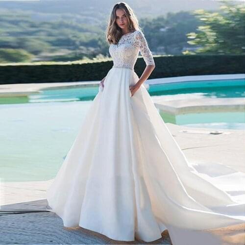 Satin Princess A-Line Wedding Dresses Half Sleeves Elegant Appliqued Bride Dress Rhinestone Belt Beach Wedding Gowns Boho Luxury
