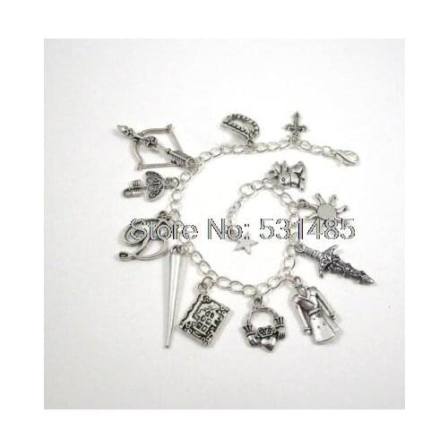 12pcs Buffy the Vampire Slayer Charm Bracelet cross Vampire Fangs charm bracelet