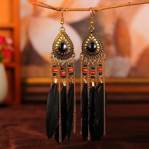 Retro Palace Style Womens Feather Earrings Ins Long Water Drop Painting Oil Rice Bead Earrings Holiday Style Charm Christmas