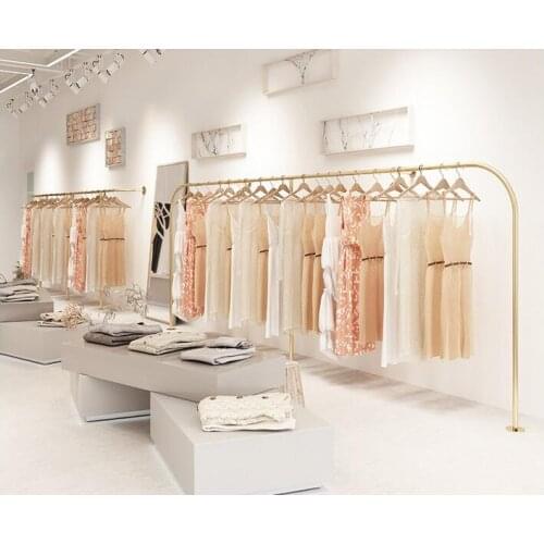 Clothing store display rack womens wear wall childrens wear wall hanging golden clothes hanger floor shelf clothes