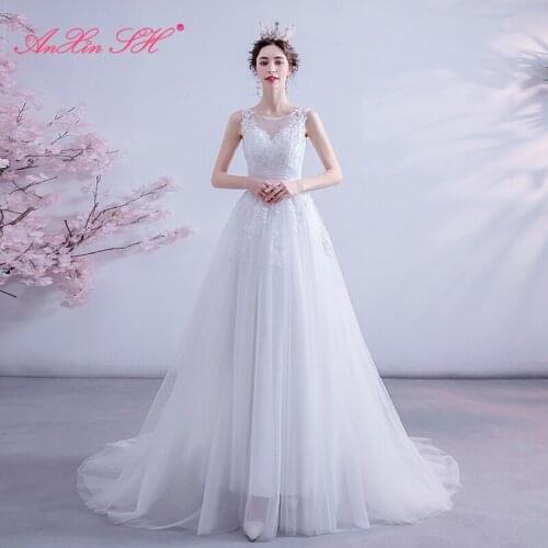 AXJFU vintage princess Sexy lace o neck illusion sleeveless Princess Bride seascape exterior backless tail wedding dress 229