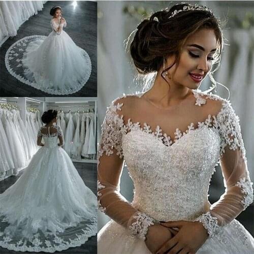 Dubai Elegant Long Sleeves A-line Wedding Dresses Sheer Crew Neck Lace Appliques Beaded Vestios De Novia Bridal Gowns