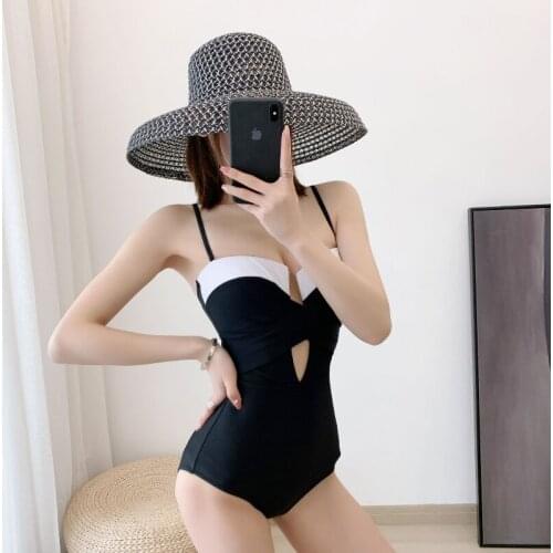 2021 New Conservative One-piece Swimsuit Women Japan and South Korea Black and White Twist Bag Sexy Backless Bikini Woman
