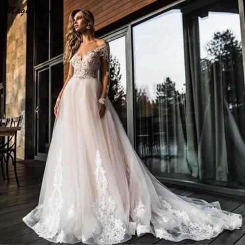 Magic Awn Bohemian Lace Tulle Wedding Dresses Long Sleeves Illusion Appliques Princess Beach Country Wedding Paryu Gowns Vestido