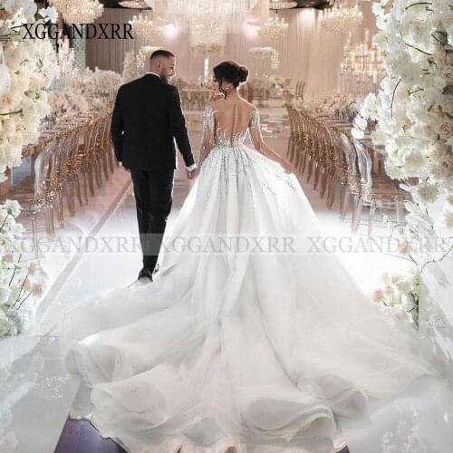 Luxury Two In One Wedding Dress Long Sleeves Bridal Gown Heavy Beading Illusion Back Chapel Train Dubai Bride Customm Made