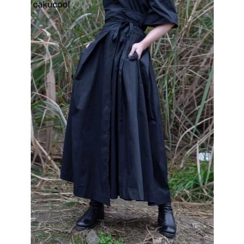 Cakucool New Women Japanese Style Skirt Autumn Asymmetric Designer Black Striped Ripped Edges Streetwear Midi Skirts For Women