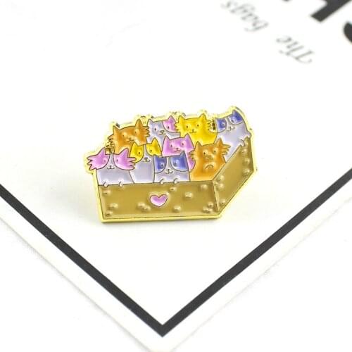 Yellow square box of a variety of styling cats cute pet brooch to attract childrens toy clothes skirt to wear for children gift