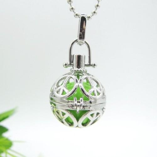 The popular Peace sign Locket Cage With Nice Homony Chime Jingle Ball Pregant Women`s Necklace Jewelry