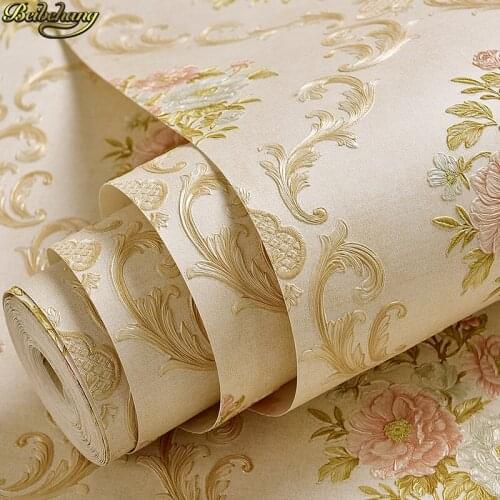 Beibehang Environmental nonwovens European pastoral hook flowers wallpaper 3D relief living room bedroom wedding room TV wall
