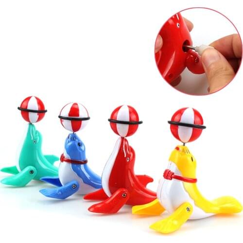 4pcs/Lot Random Color Sea Lion Wind Up Toys NEW Clockwork Funny Toy Cartoon Clown Clockwork Toys Sea Lion Educational Toys