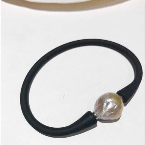 NEW Natural purple freshwater pearl with Nucleated Baroque size About 13X15MM Rubber bracelet 7.5"