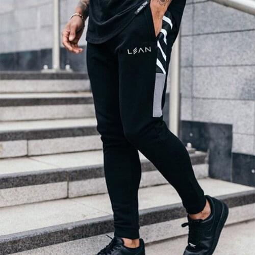 2021 Spring and Autumn New Muscle Brothers Sports Fitness Pants Mens Pocket Patchwork Casual Foot Pants Slim Fit Stretch Pants