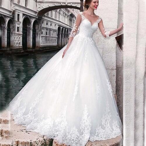 Chic Tulle Jewel Neckline A-line Wedding Dresses 2021 Lace Appliques sleeves Bridal Gowns Illusion Buttons Back robe de mariee