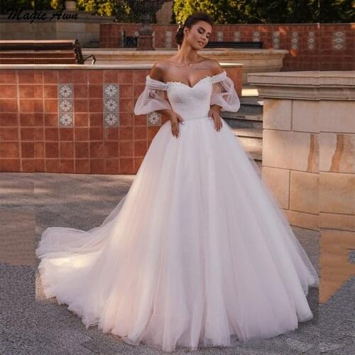 Magic Awn Princess Light Pink Wedding Dresses Off The Shoulder Detachable Sleeves Lace Appliques Beads Beach A-Line Bridal Gowns