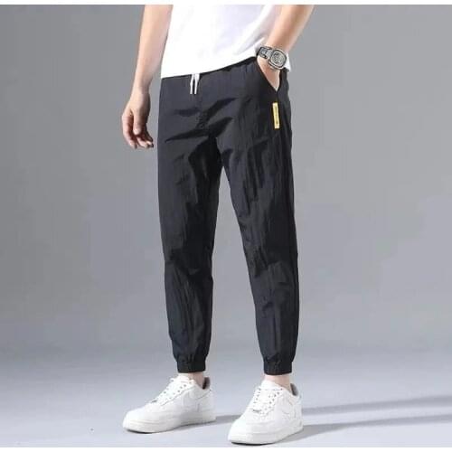 Ice Silk Pants Mens Summer Thin Section Trend Wild Loose Casual Pants Sports Pants Quick-drying Harlan Nine-point Pants 5XL