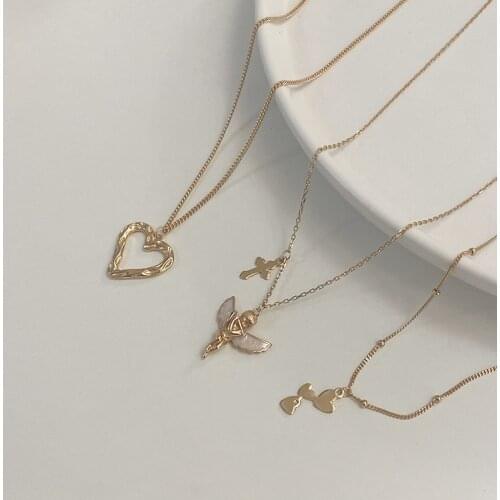 Silvology 925 Sterling Silver Cross Angel Heart Pendant Necklace Elegant Cute Hiphop Layers Necklace for Women Stylish Jewelry