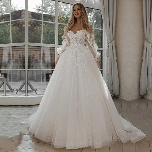 Vestidos de novia 2021 Fashion Glitter Wedding Dresses Puff Sleeve Appliques Lace 3D Flowers off Shoulder Tulle Boho Bride Gown