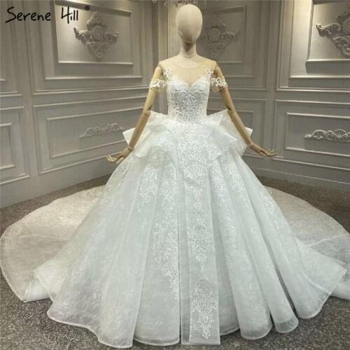 High-end Luxury Vintage Ivory O-Neck Wedding Dresses 2021 Short Sleeves Beading Sequins Bride Gowns HA2330 Custom Made