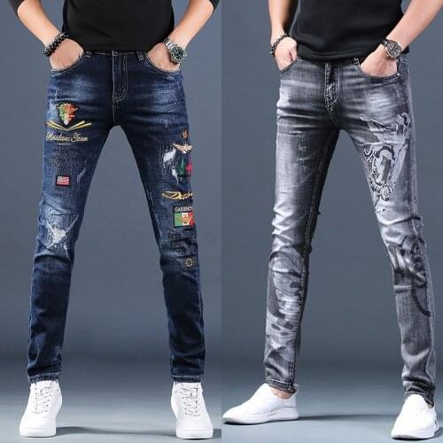 Mens print scratched jeans korean slimming fashion trousers embroidery trendy wash denim pants four seasons casual jeans