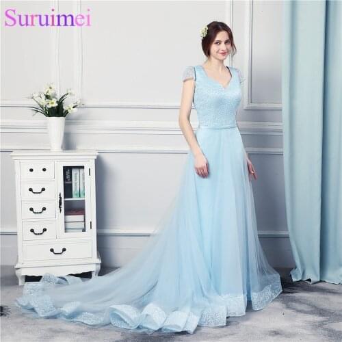 Light Baby Blue Prom Dresses High Quality Tulle Beaded With Lace Applique Hem Line Backless Sexy Evening Gown Bow Knot