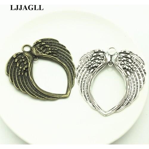 LJJAGLL Wholesale 100pcs 65*68mm Zinc Alloy Silver Tone Big Angel Wing Pendants Feather Charms Diy Jewelry Findings AYM020