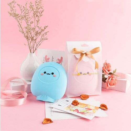 Cute pink silicone hot water bottle Warm Belly Treasure Hand Warmer Filled Explosion-proof Hot Water Bags Microwave heating
