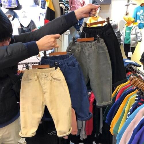 2020 autumn and winter new solid color male and female baby fashion wild front pocket corduroy plus velvet pants