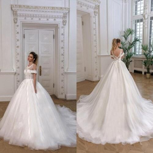 2020 Ball Gown Wedding Dresses Jewel Short Sleeves Lace Appliques Bridal Gowns Custom Made Backless Sweep Train Wedding Dress