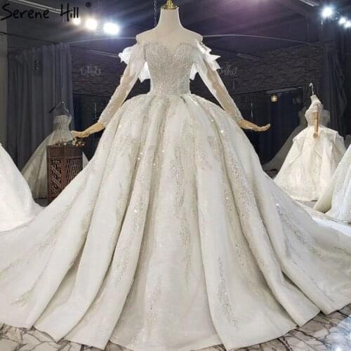 Luxury Ivory Long Sleeve Sparkle Wedding Dresses 2020 Dubai Off Shoulder Beading Pearls Bridal Gowns HX0206 Custom Made