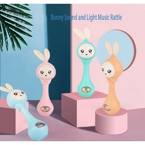 Musical rabbit rattle baby toy light teether soft rubber can bite teeth hand crank early education educational baby toy