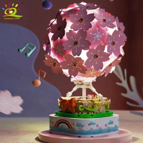 HUIQIBAO 718pcs Idea Simulation Cherry Hot Air Balloon Music Box Building Blocks Sakura Bricks Set Children Toys Home Decoration