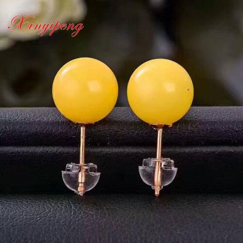 Xinyipeng 18 k gold inlaid natural beeswax stud earrings Amber earrings Female fine jewelry Simple fashion jewelry ball