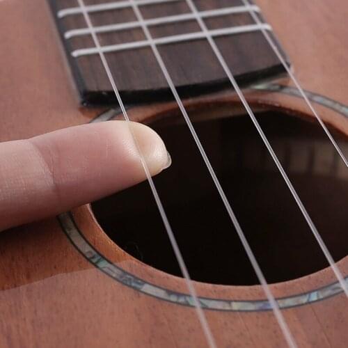 4pcs Ukelele Ukulele Uke String Carbon Fiber Material Transparent Guitar Parts & Accessories