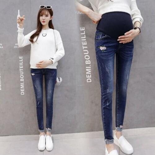 New spring and summer rose pregnant women pants Korean version of maternity clothes small feet stretch stomach lift jeans