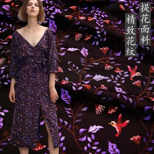Apparel fabric high-grade jacquard brocade fashion spring and autumn big-band floral dress windbreaker coat fabric wholesale