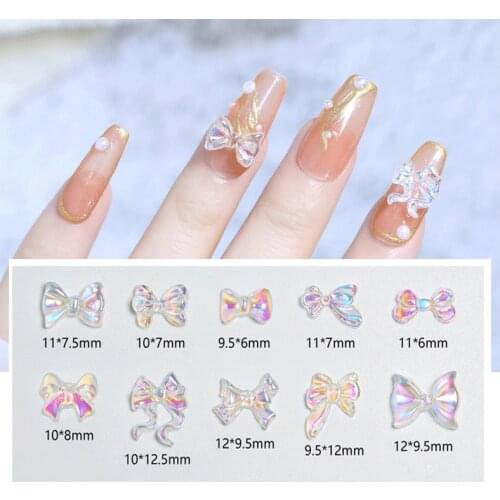 50Ppcs Aurora Bowtie Nail Charms 50pcs 1 Bag (12shape) 3D Aurora Butterfly Nail Art Rhinestones Resin Butterfly-Shape Bow ,87(8)