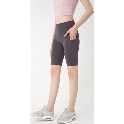 2021 New Yoga Clothes Five-point Cycling Pants Nude Side Pockets High Waist Hip-lifting Elastic Fitness Sports Yoga Pants Women